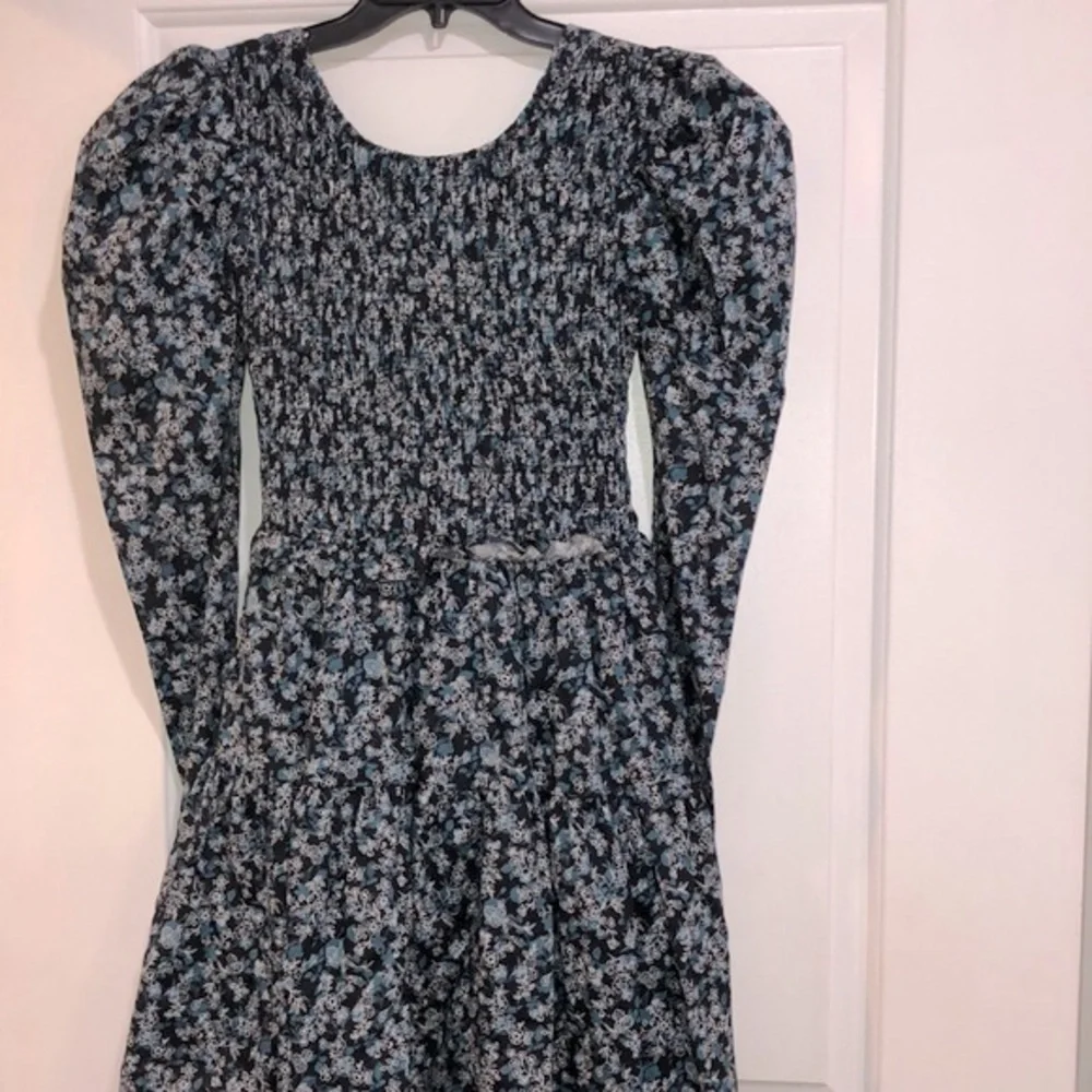 The Polly dress ditzy floral smocked boho dress size medium new with tags